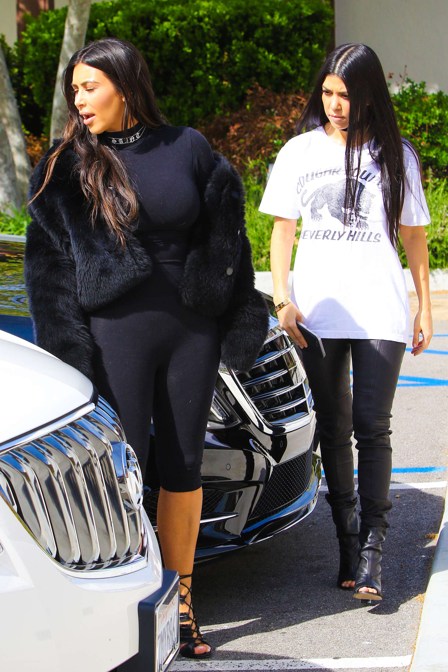 Kim and Kourtney Kardashian out in Calabasas