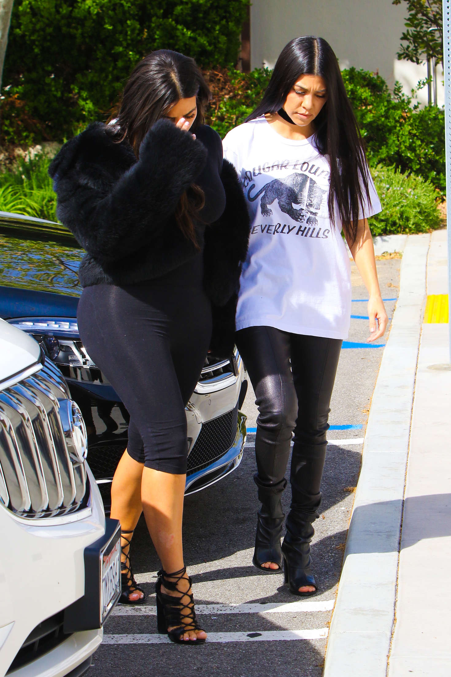 Kim and Kourtney Kardashian out in Calabasas