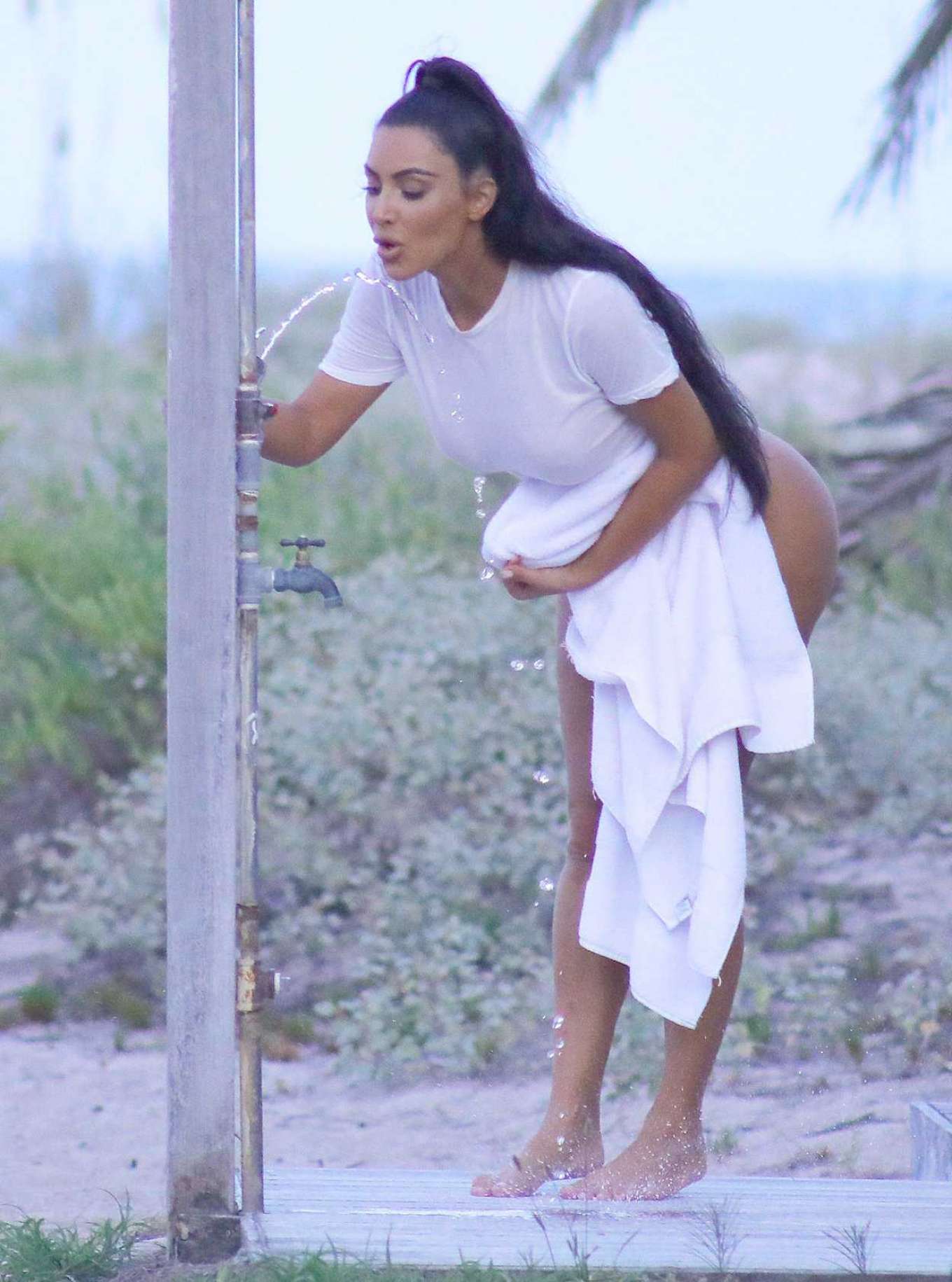 Kim Kardashian in Bikini â€“ Photoshoot at Beach in Miami