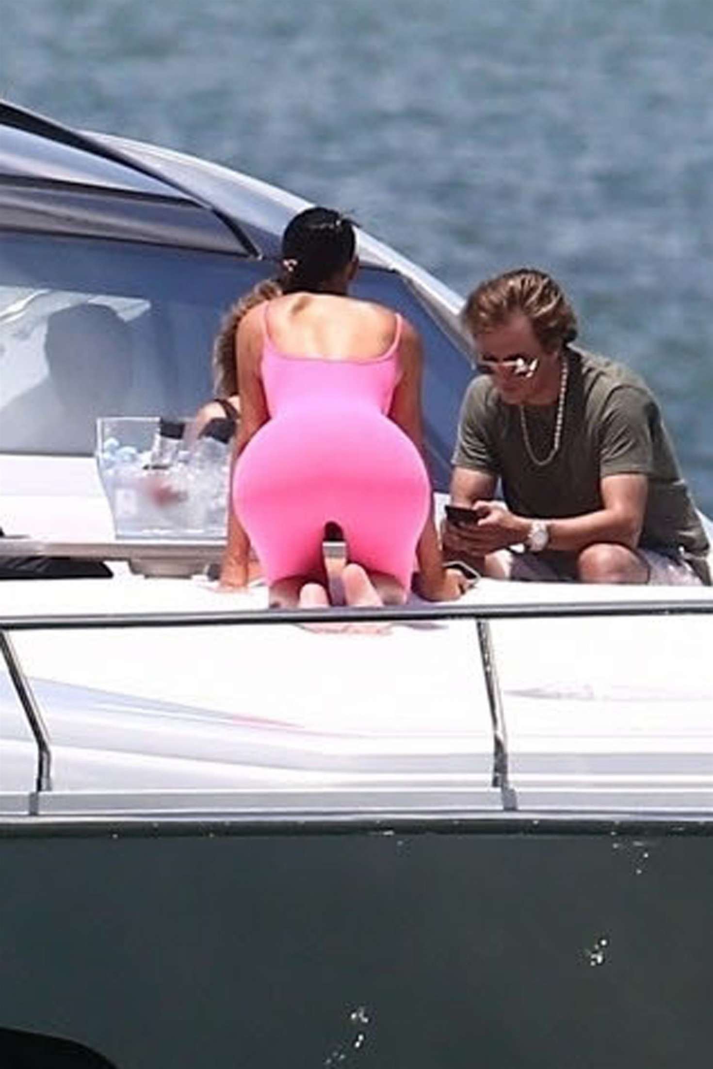 Kim Kardashian in Pink Tights on a boat in Miami