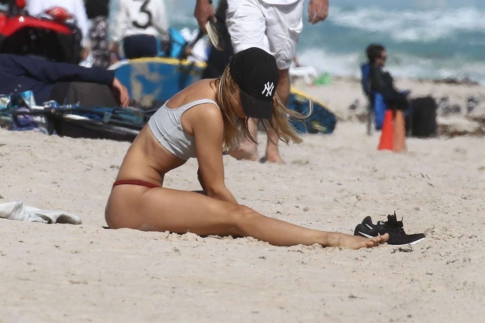 Kimberley Garner in Red Bikini and Sports Bra at the beach in Miami