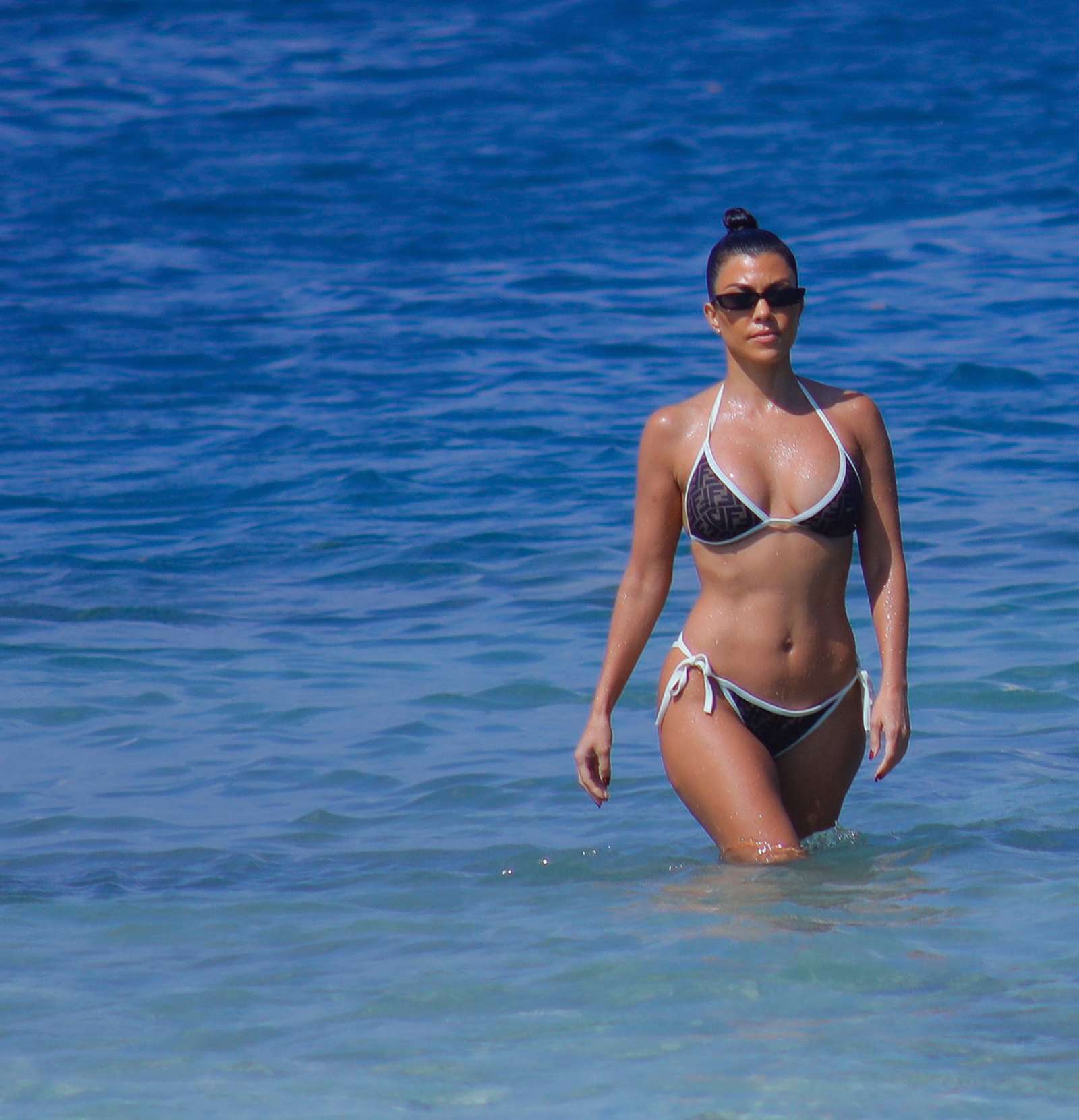 Kourtney Kardashian in Bikini on the beach in Bali