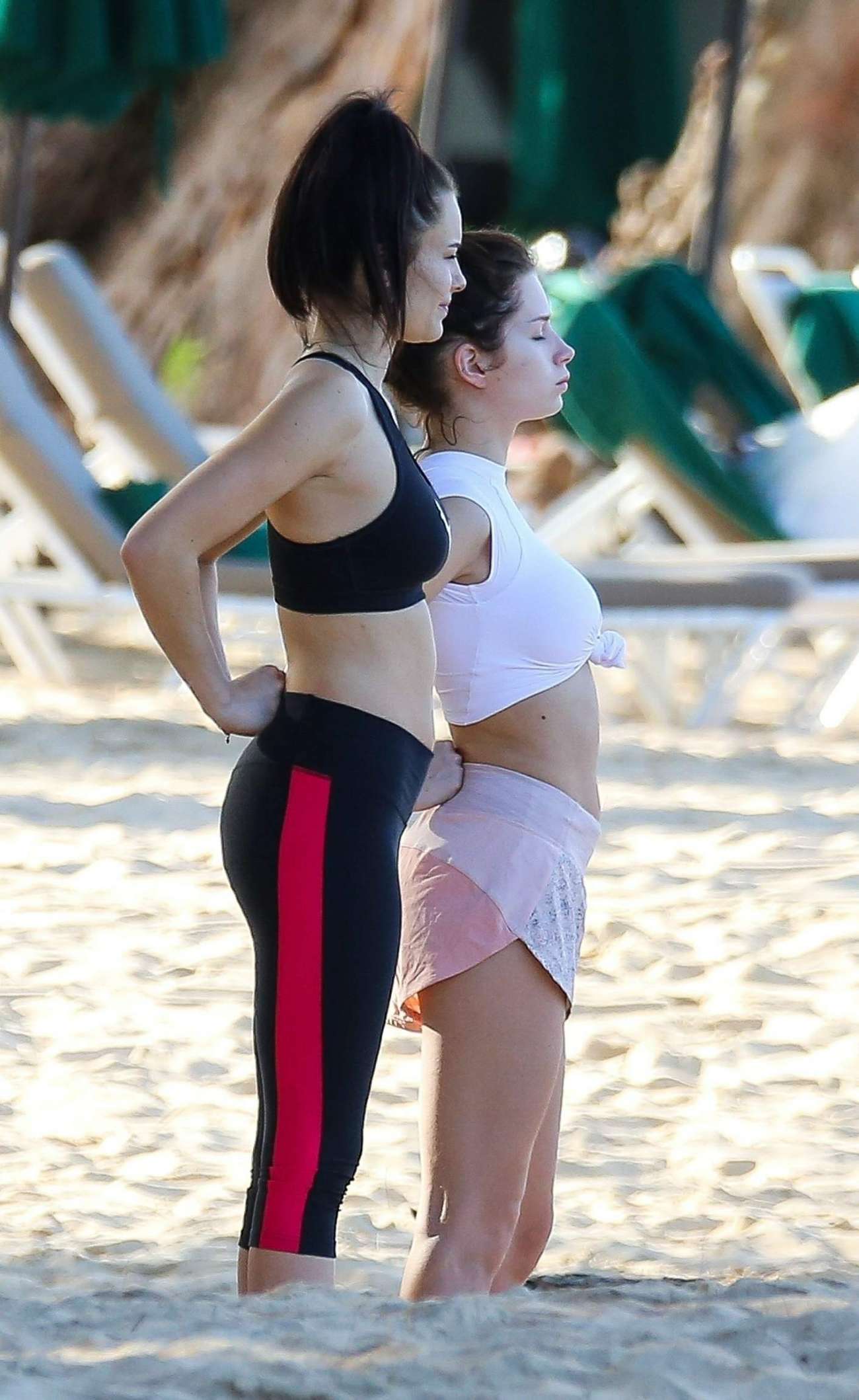Lottie Moss and Emily Blackwell a yoga class on the beach in Barbados