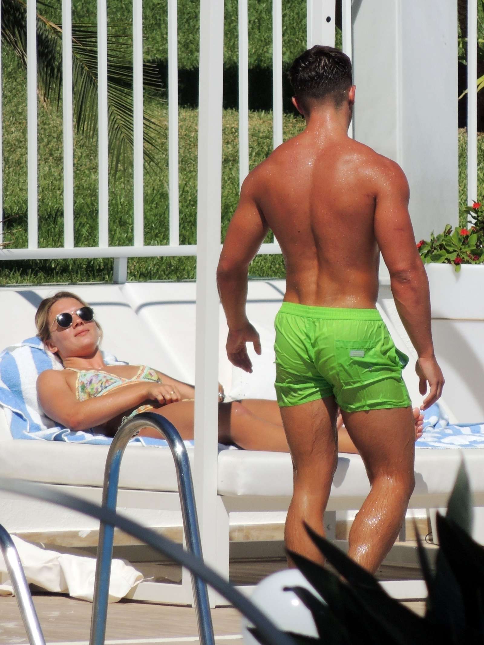 Louisa Johnson in Bikini at a pool in Marbella
