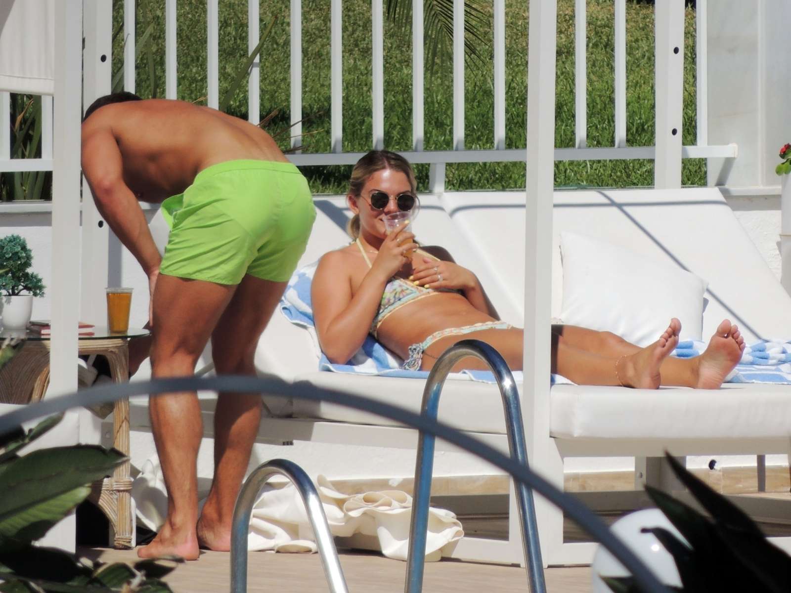 Louisa Johnson in Bikini at a pool in Marbella
