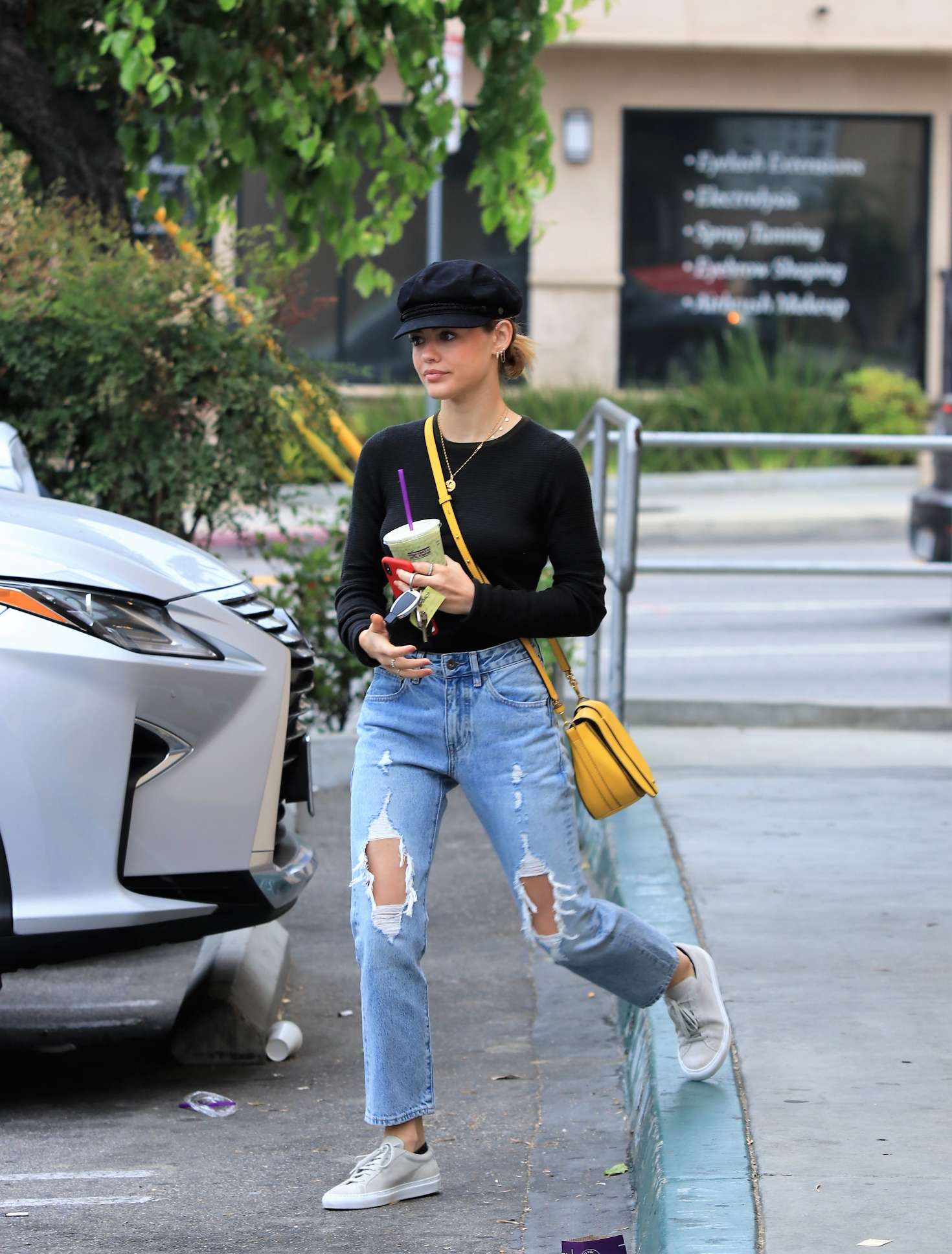 Lucy Hale in Ripped Jeans at Coffee Bean in Studio City