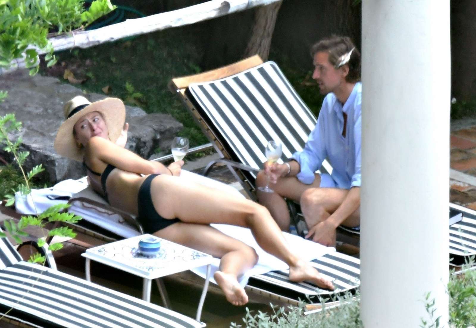 Maria Sharapova in Black Bikini at the pool in Positano