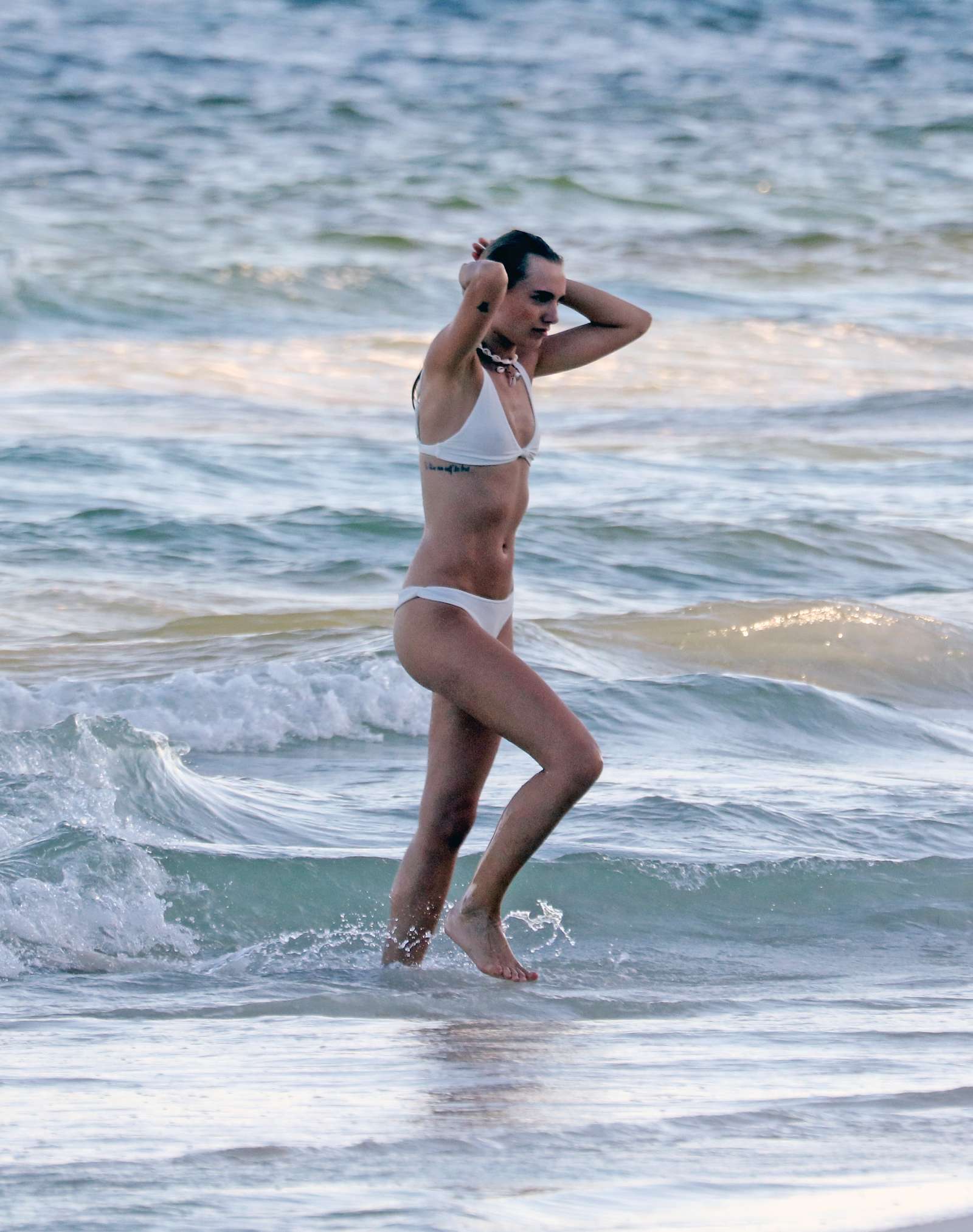Maya Stepper in White Bikini on the beach in Mexico