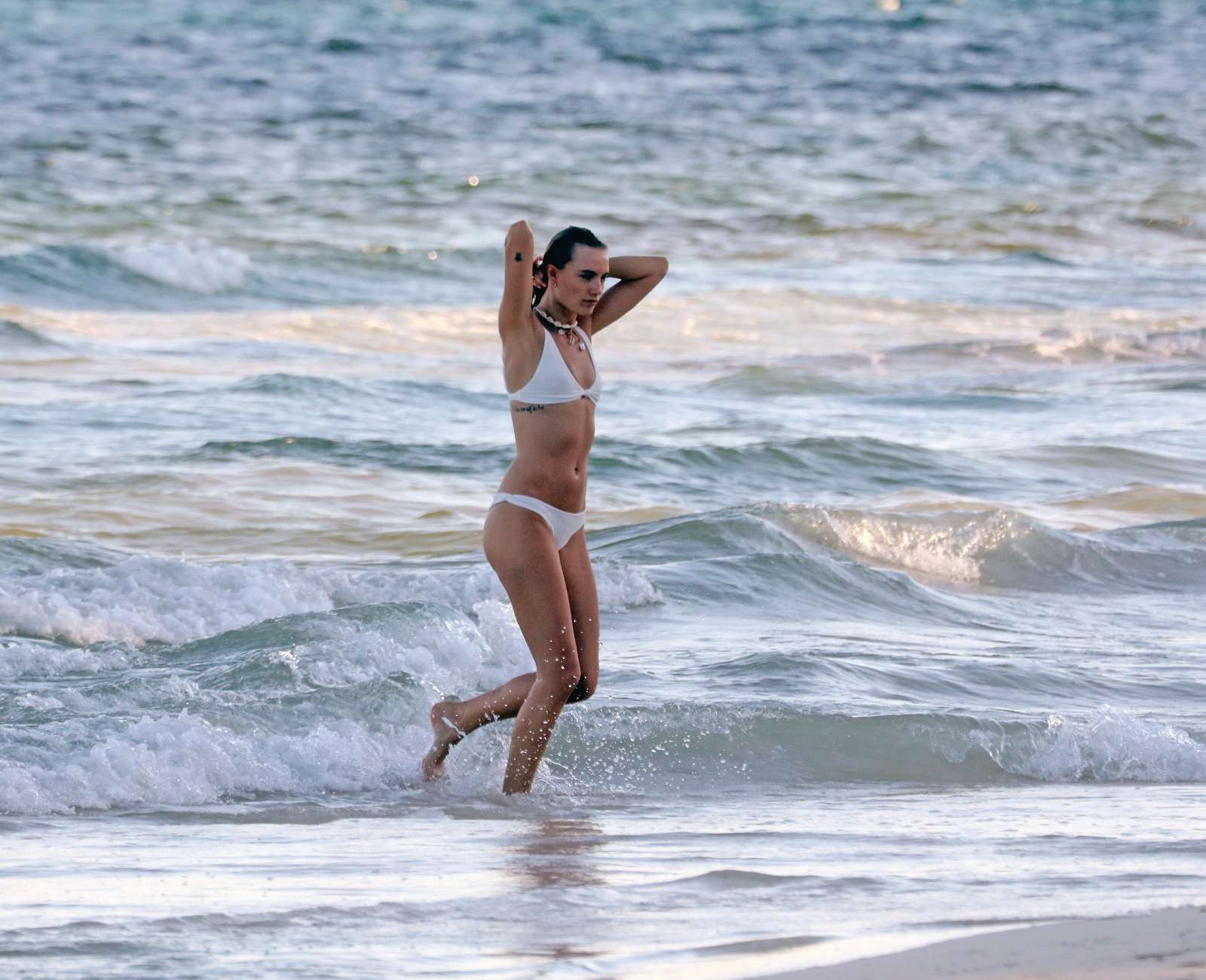 Maya Stepper in White Bikini on the beach in Mexico