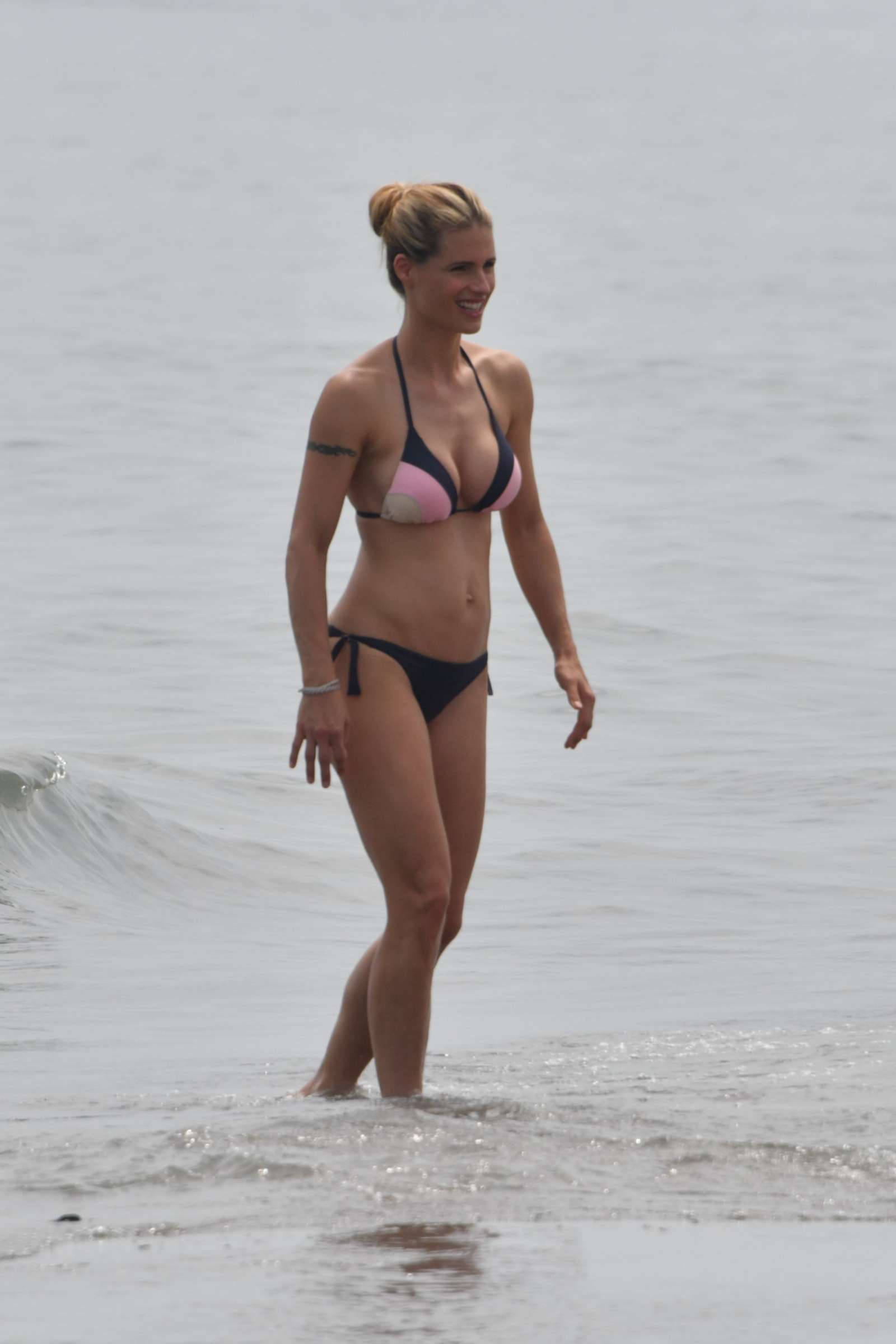 Michelle Hunziker in Bikini on the Beach in Italy