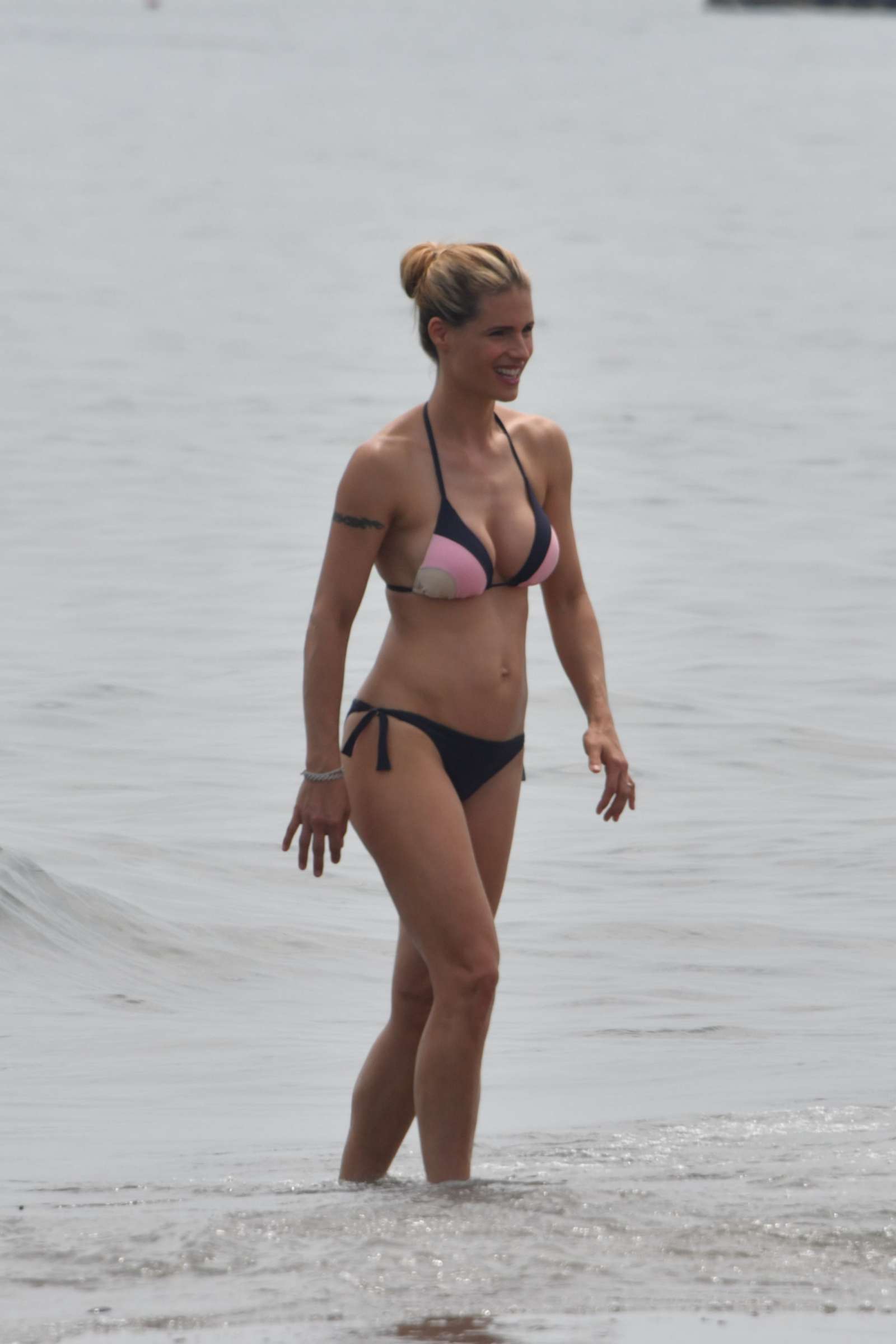 Michelle Hunziker in Bikini on the Beach in Italy