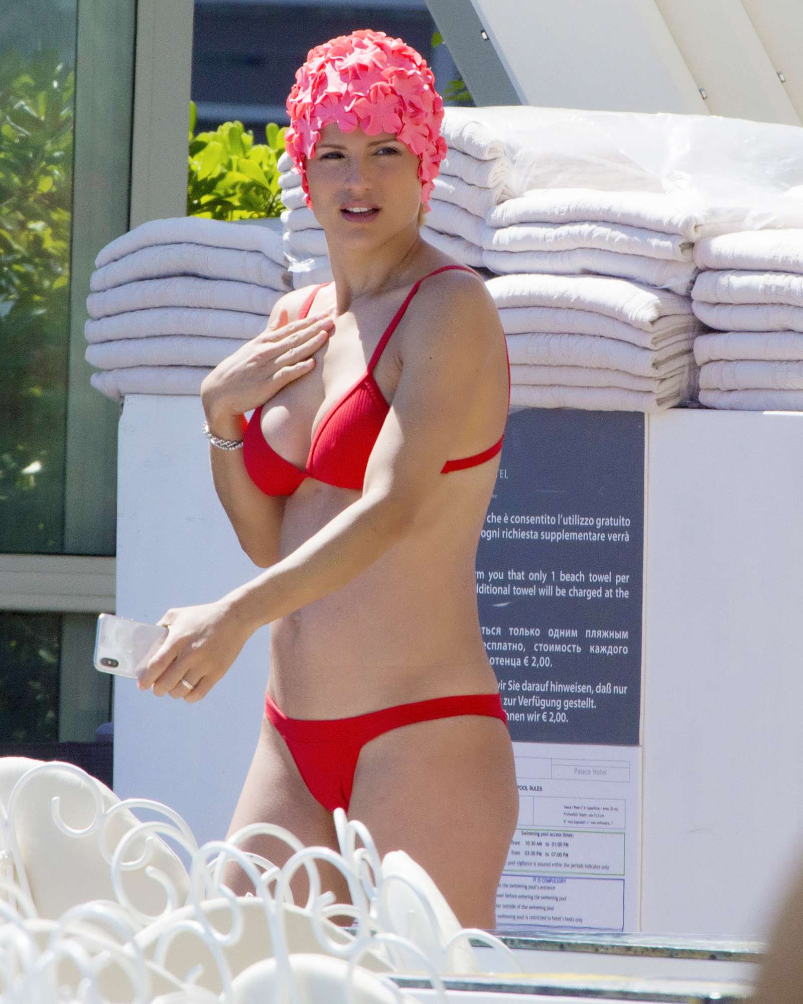 Michelle Hunziker in Red Bikini on the pool in Milano Marittima