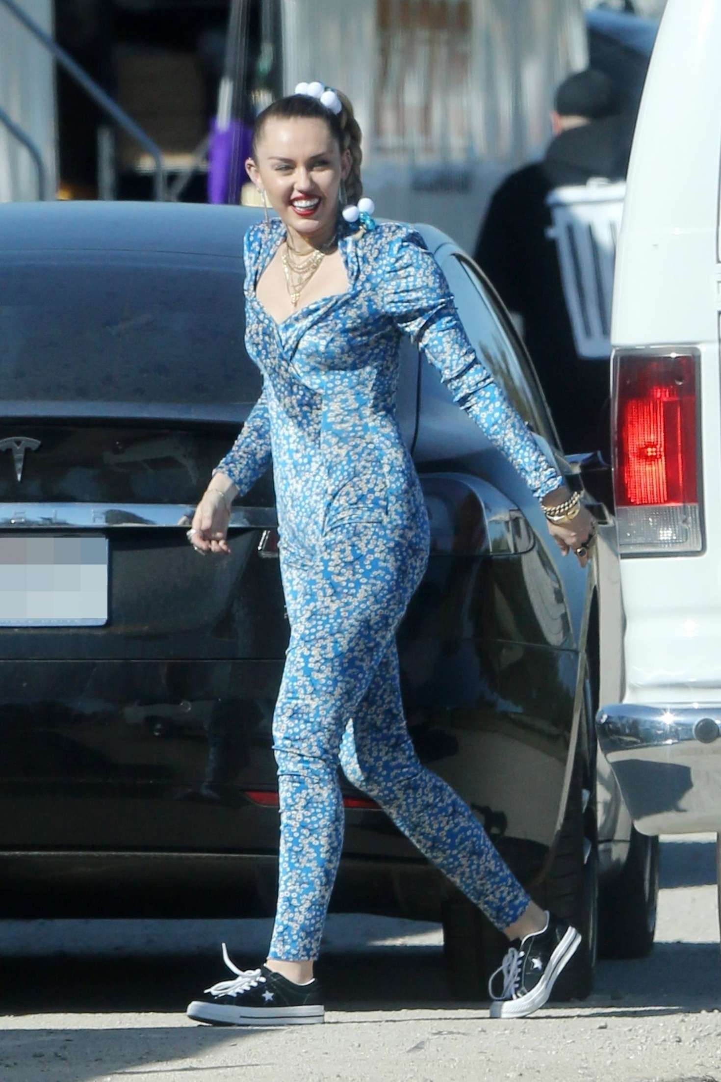Miley Cyrus in Blue Floral Jumpsuit â€“ On set of her latest project in Los Angeles