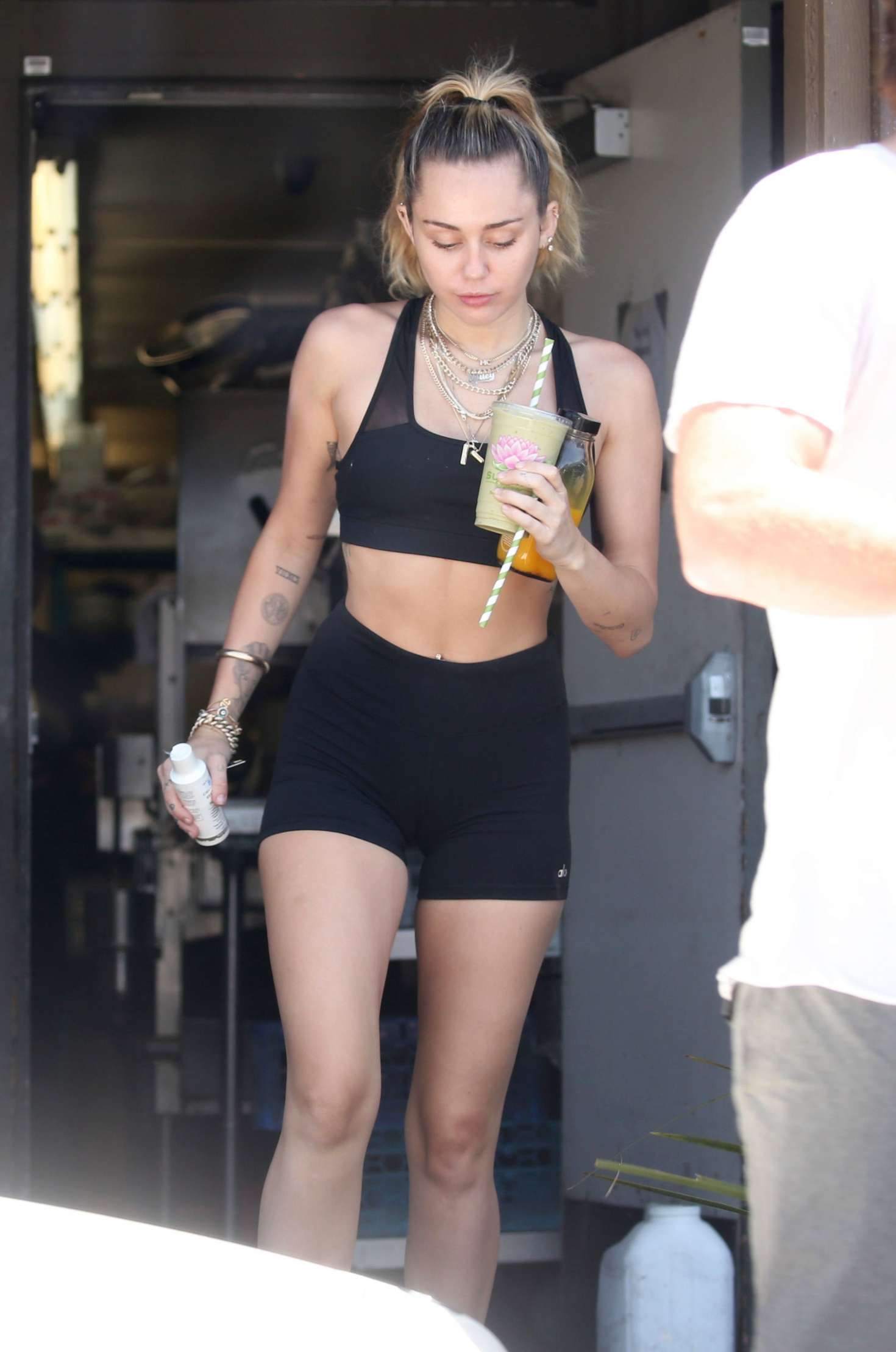 Miley Cyrus in Shorts and Sports Bra out in Malibu