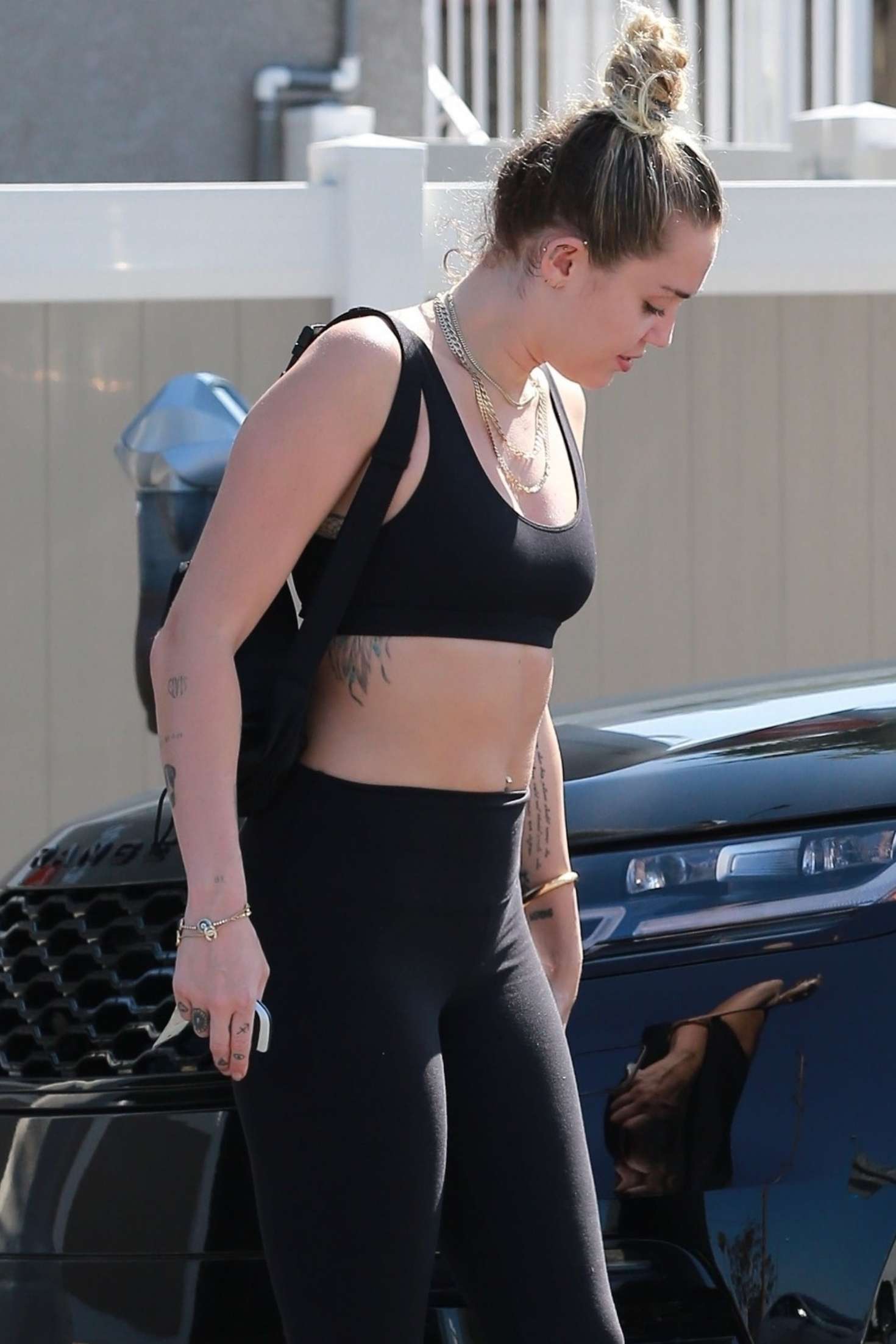 Miley Cyrus in Sports Bra and Tights at SunCafe in Studio City