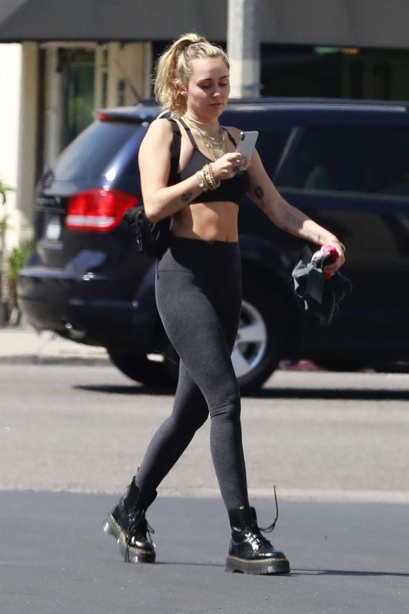 Miley Cyrus â€“ In Tights seen outside a gym in Los Angeles