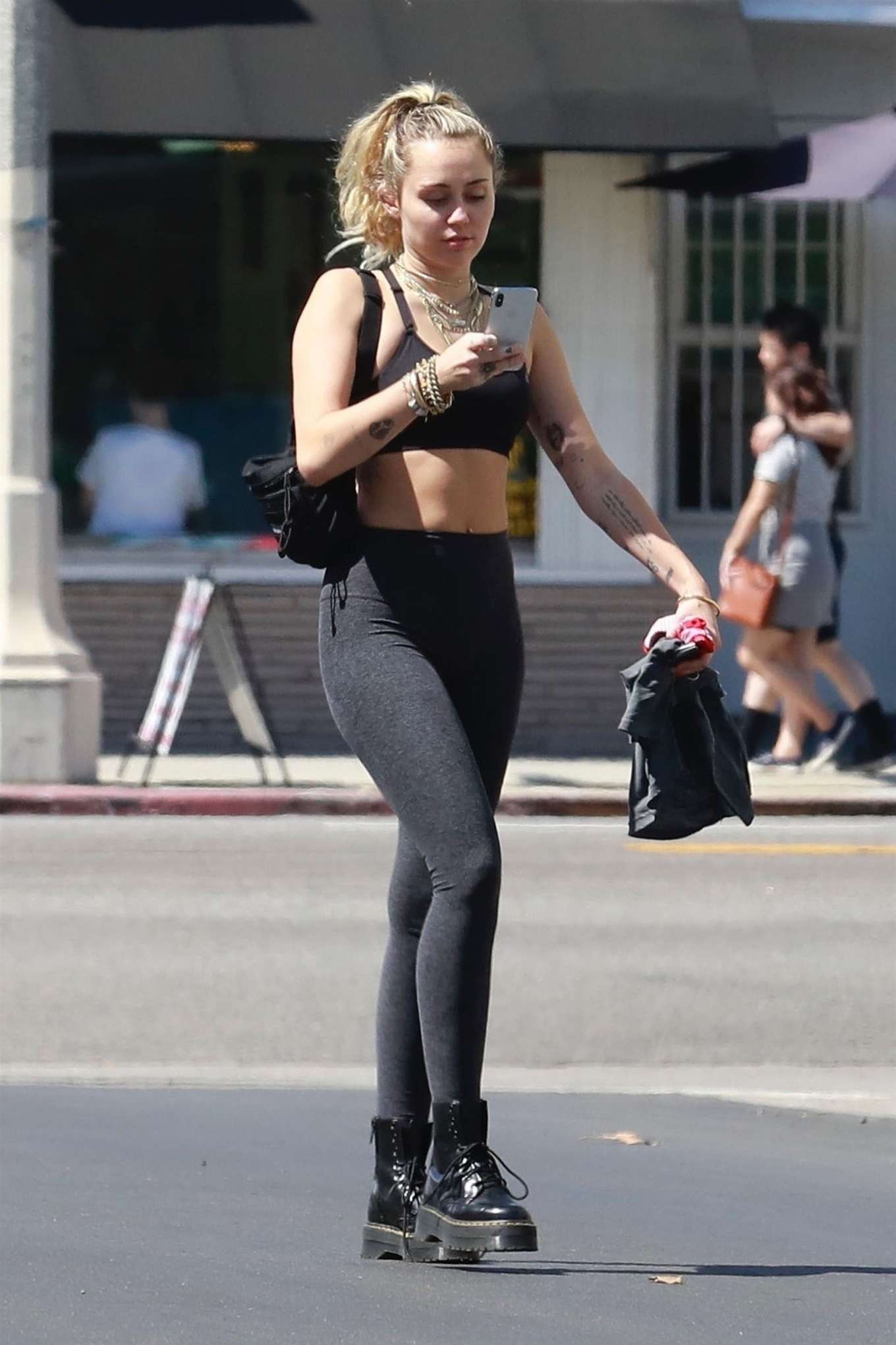Miley Cyrus â€“ In Tights seen outside a gym in Los Angeles