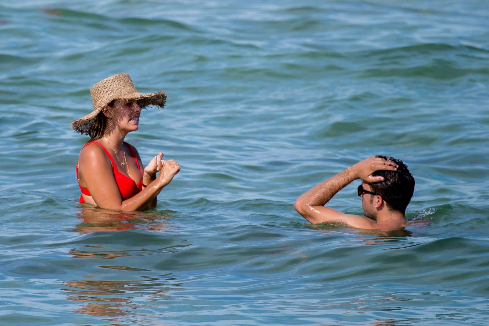 Natasha Oakley in Red Bikini on the beach in Miami