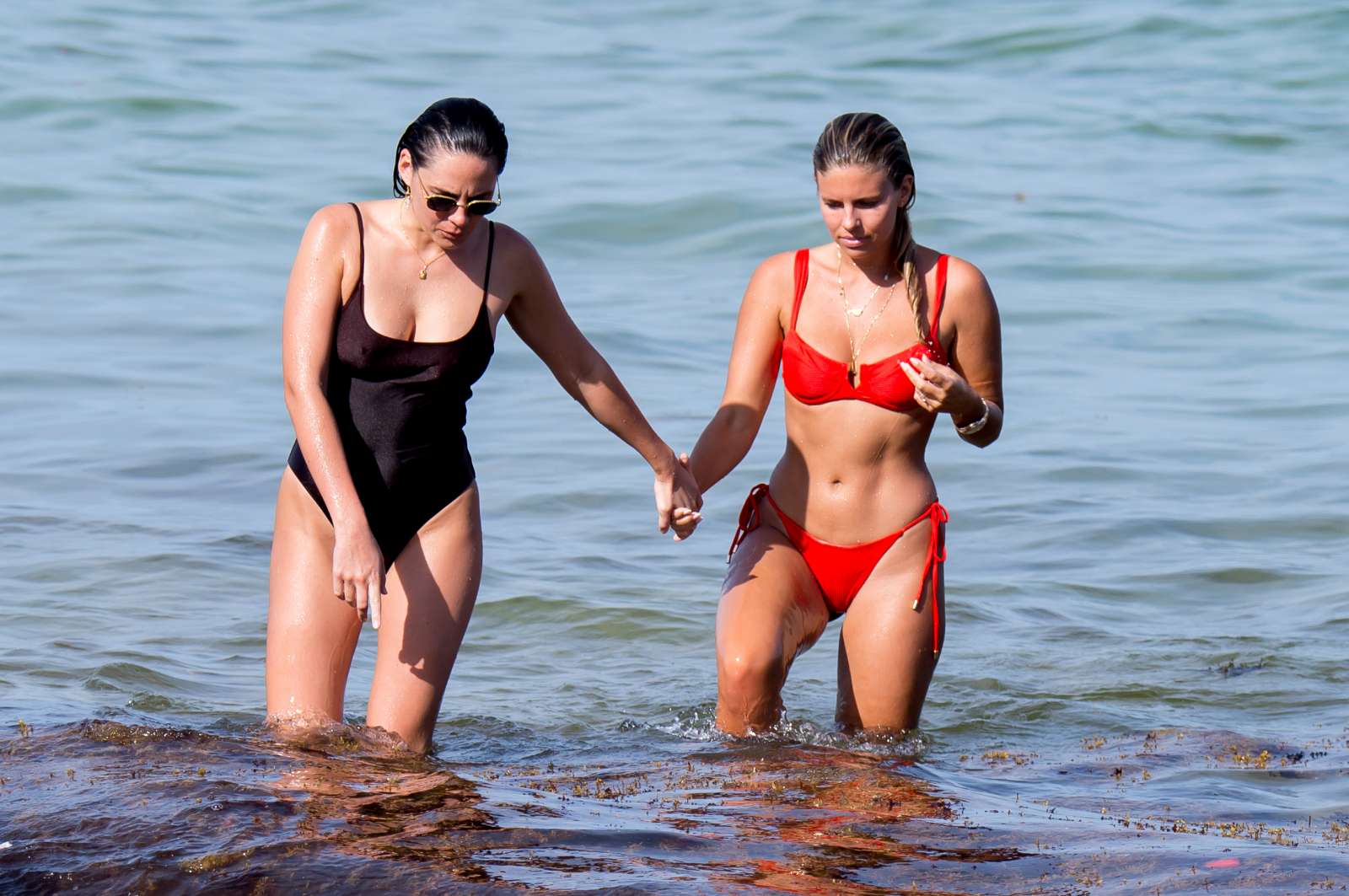 Natasha Oakley in Red Bikini on the beach in Miami