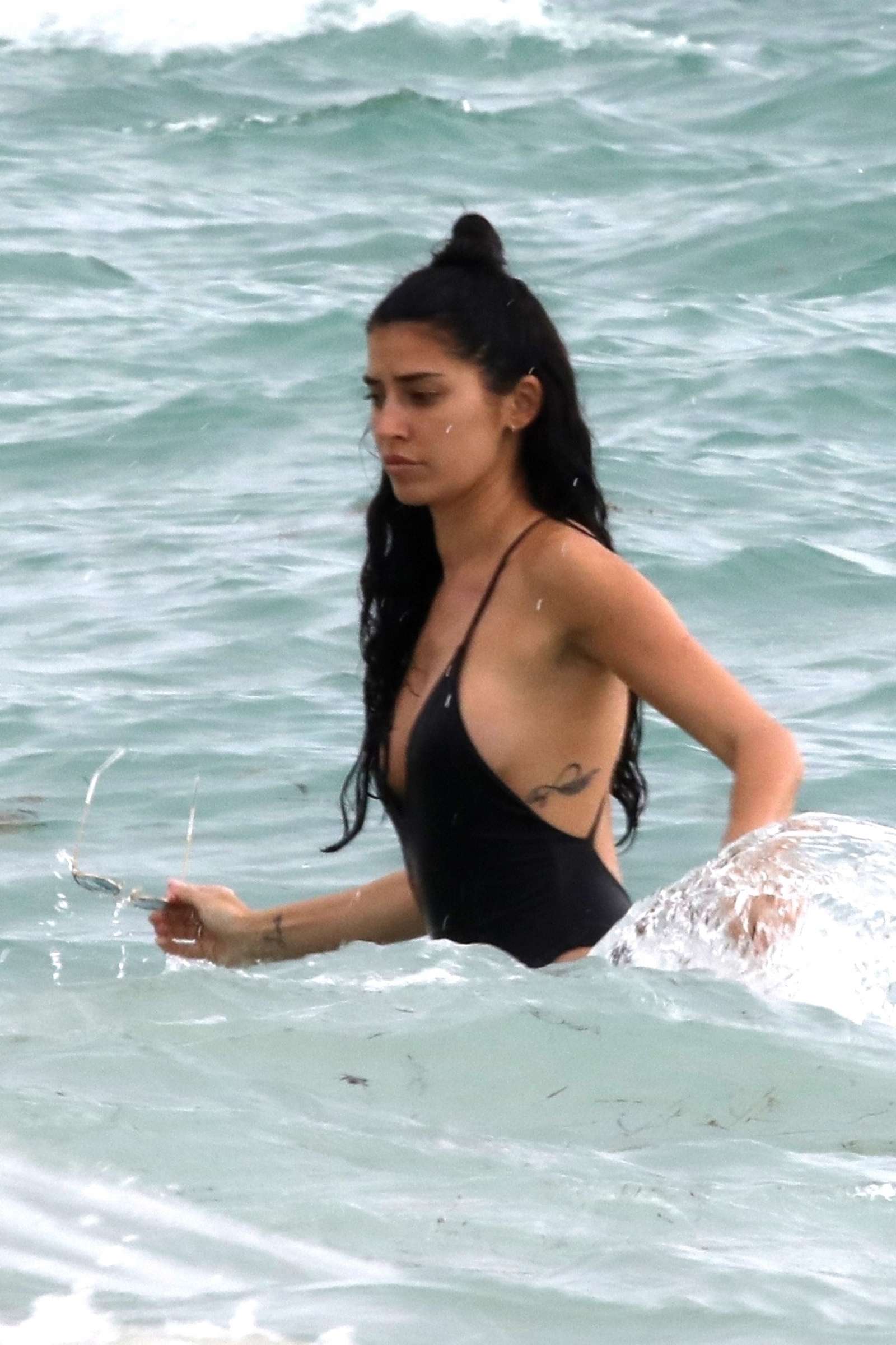 Nicole Williams in Black Swimsuit at the beach in Miami