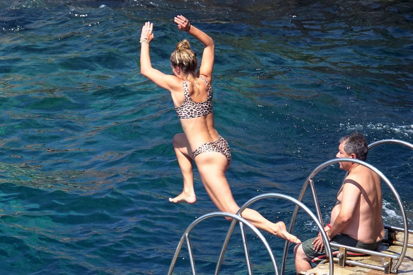 Nina Agdal in Leopard Print Bikini at a beach in Capri