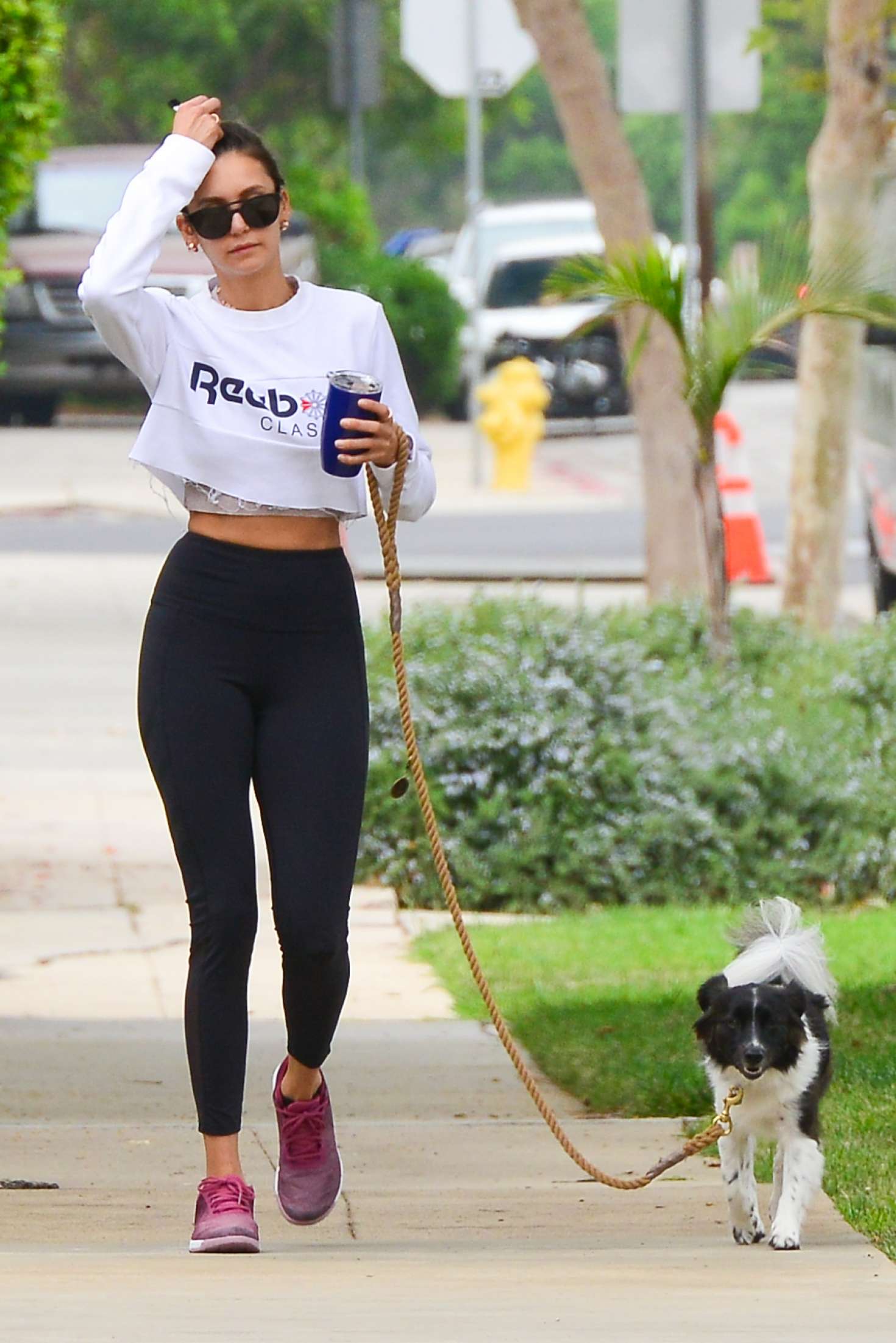 Nina Dobrev in Leggings â€“ With her dog in Los Angeles