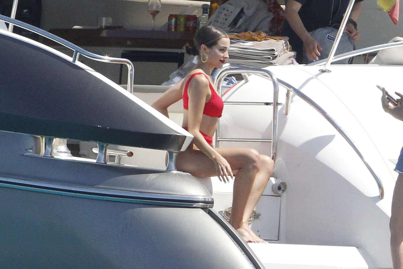 Olivia Culpo in Red Bikini on a yacht in Formentera