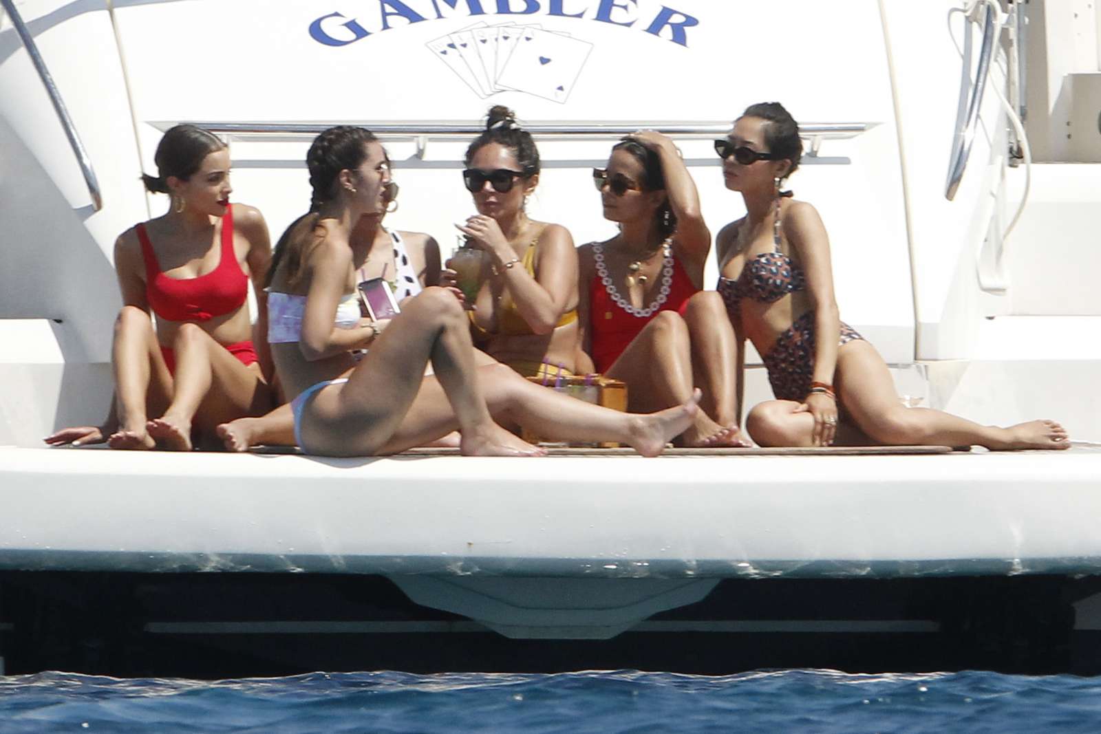 Olivia Culpo in Red Bikini on a yacht in Formentera