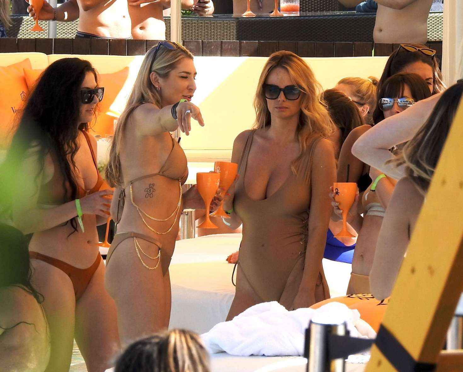 Rhian Sugden â€“ In gold tight swimsuit at Ibizas Ocean Beach Club