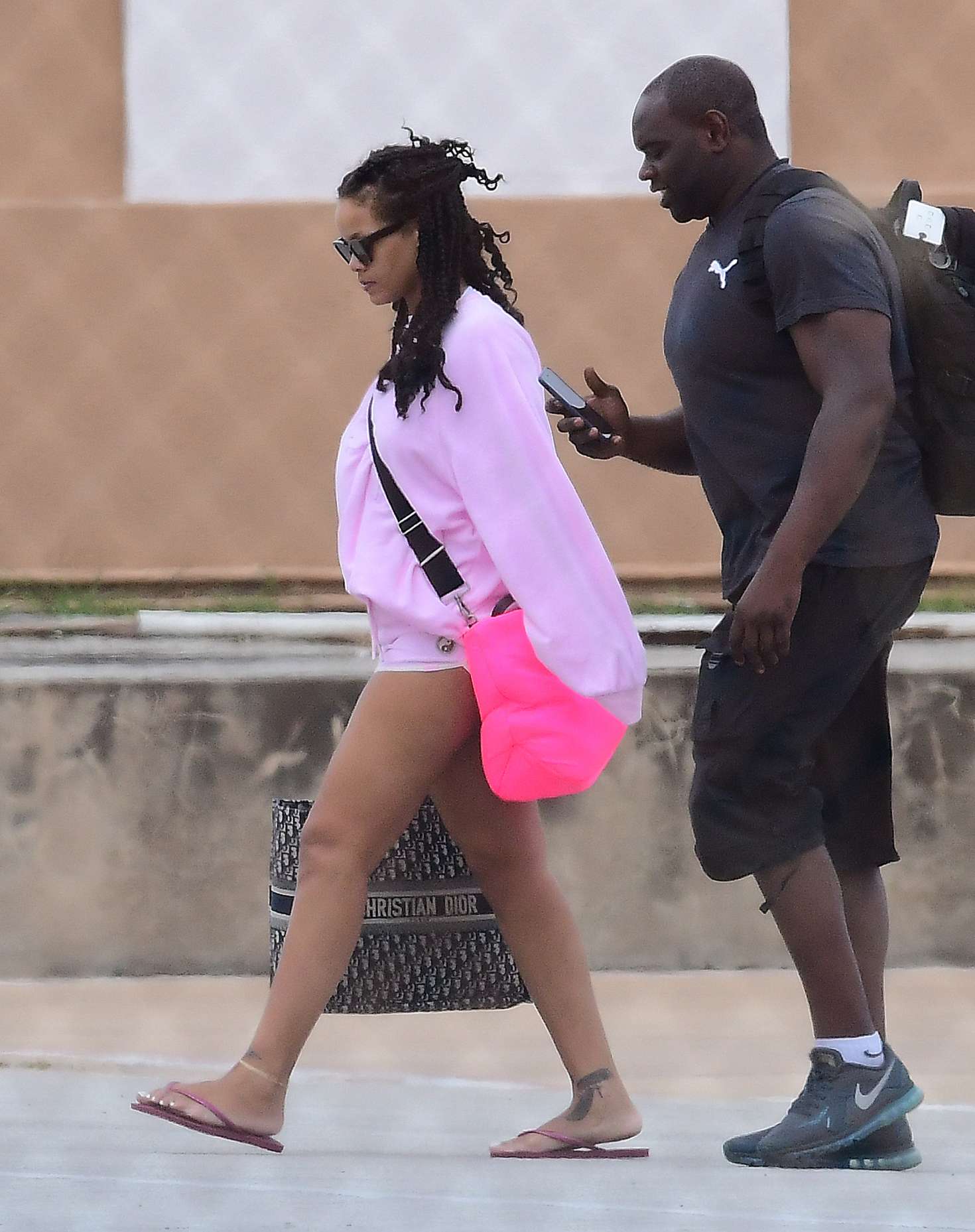 Rihanna in Pink Shorts â€“ Arrives at Airport in Barbados