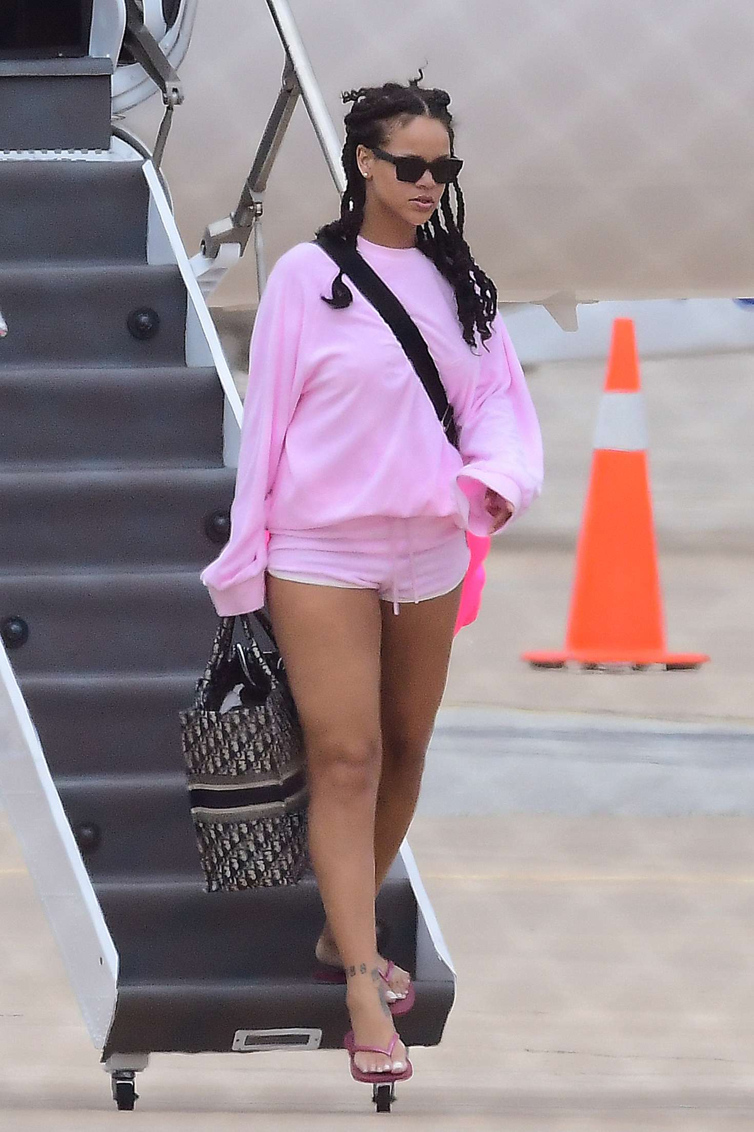 Rihanna in Pink Shorts â€“ Arrives at Airport in Barbados