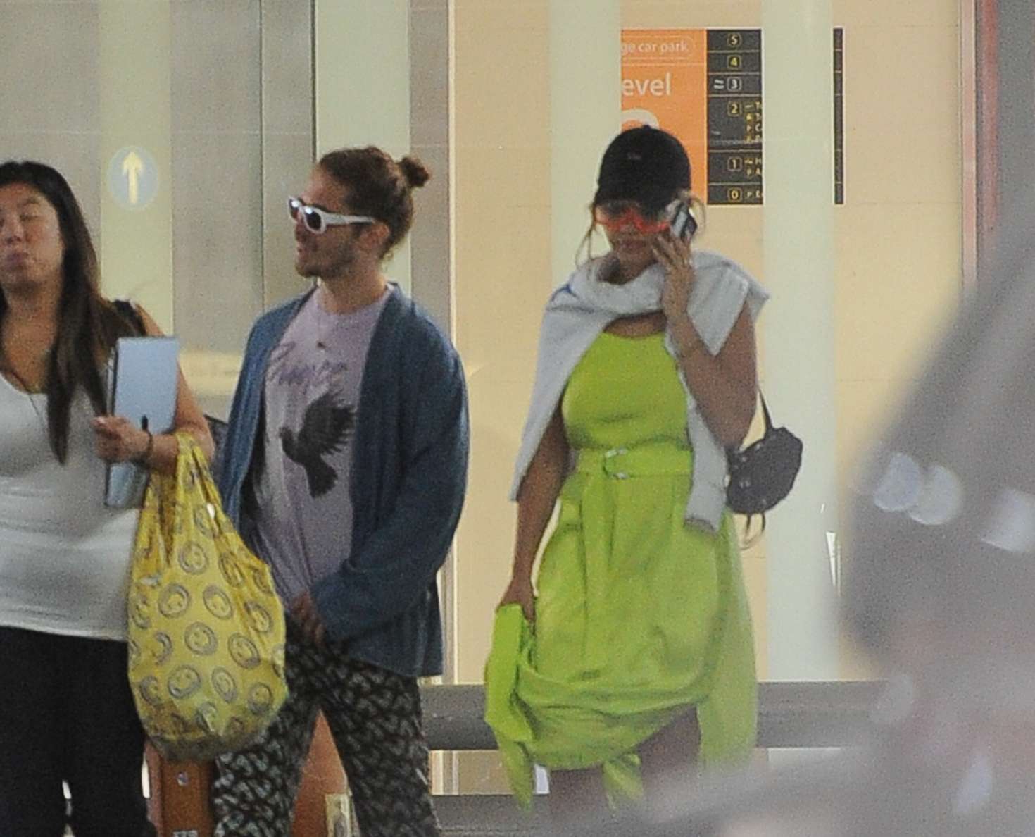 Rita Ora and Andrew Watt â€“ Arriving at Gatwick Airport in London
