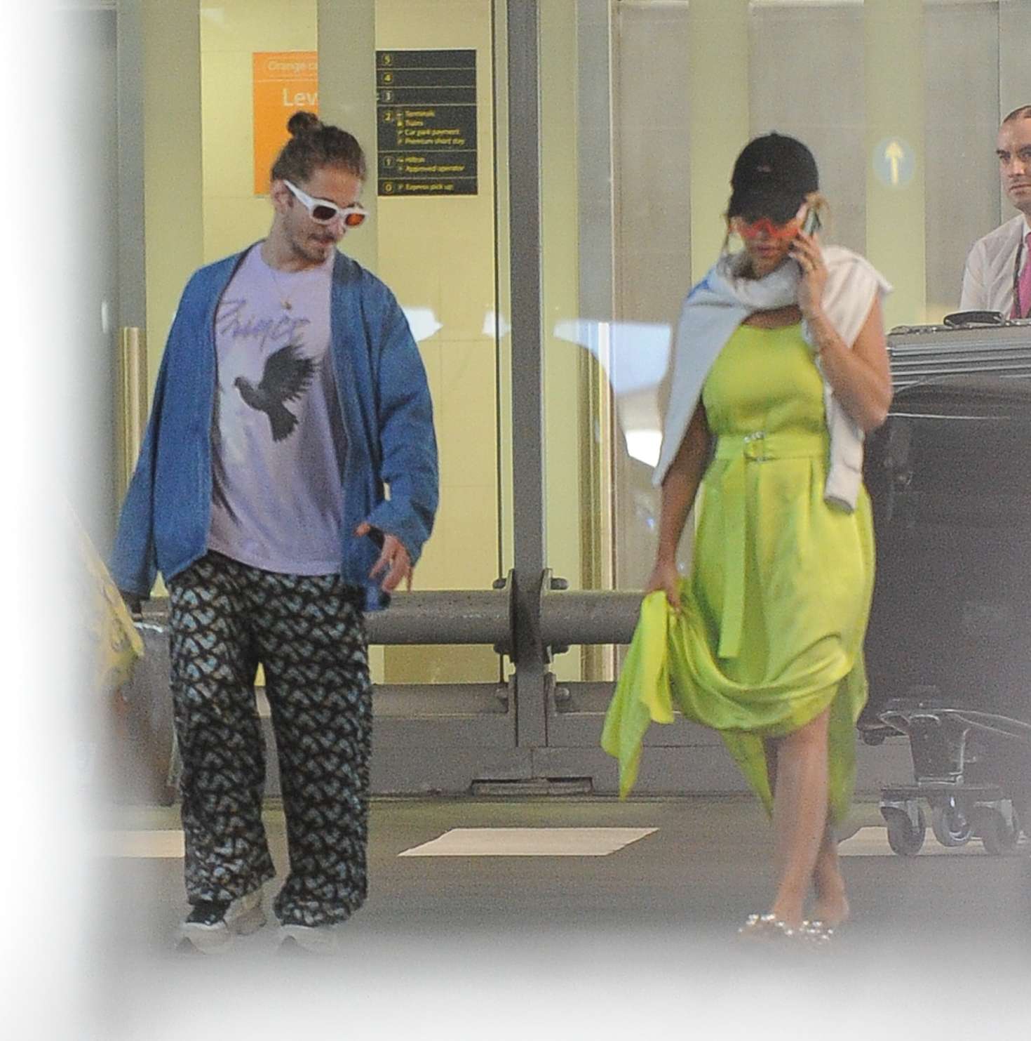 Rita Ora and Andrew Watt â€“ Arriving at Gatwick Airport in London