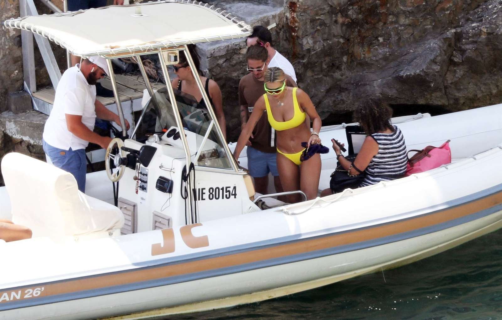 Rita Ora in a yellow bikini in French Riviera
