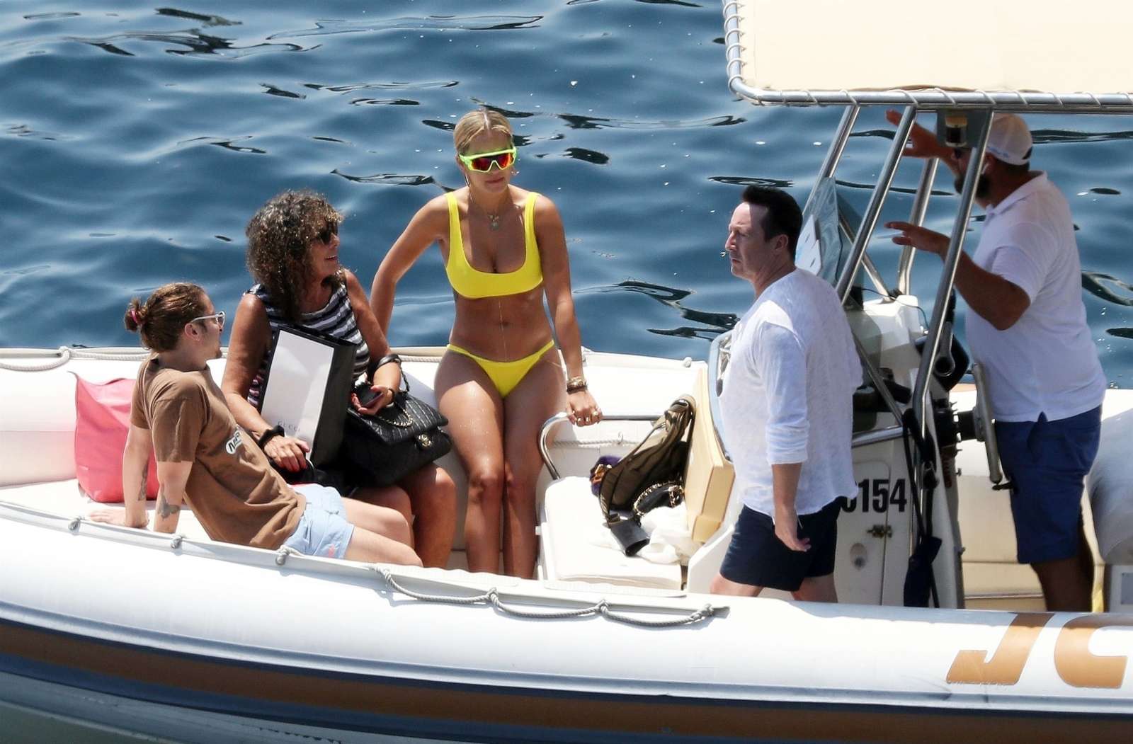 Rita Ora in a yellow bikini in French Riviera