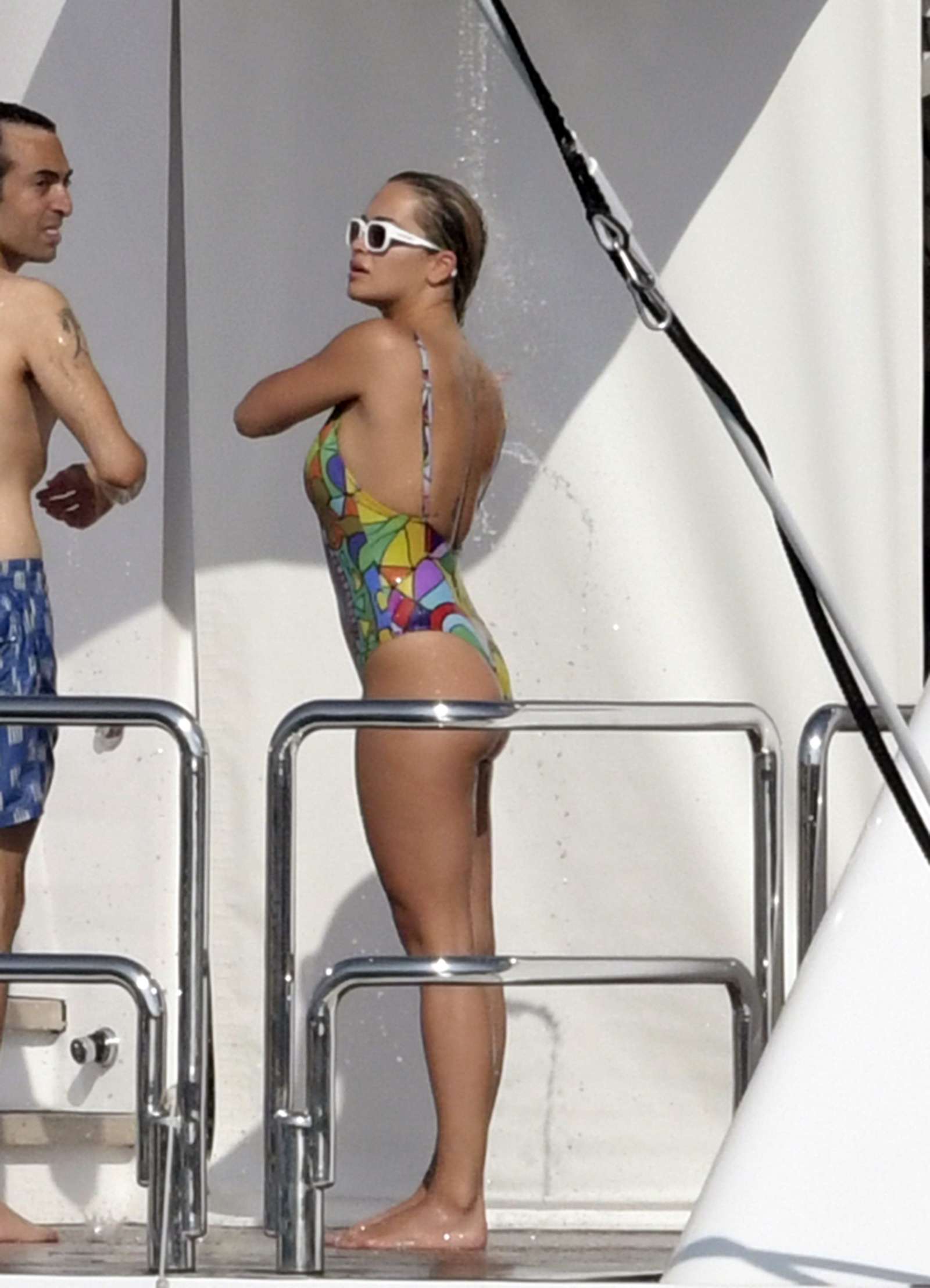 Rita Ora in Colourful Swimsuit on holiday in Porto Cervo