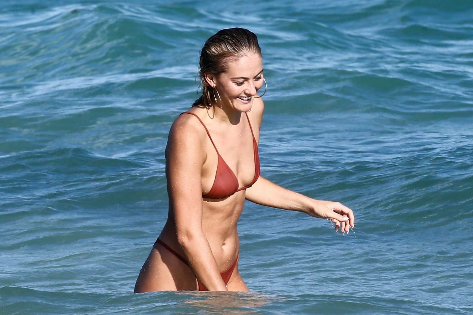 Selena Weber in Red Bikini at a beach in Miami