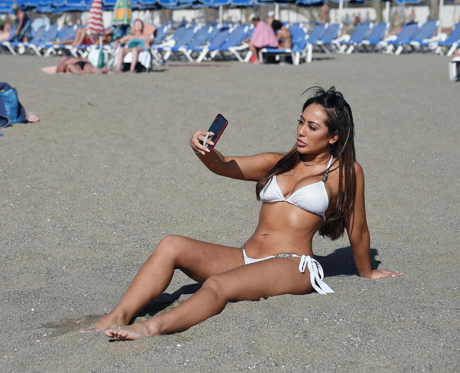 Sophie Kasaei in White Bikini on the beach in Turkey