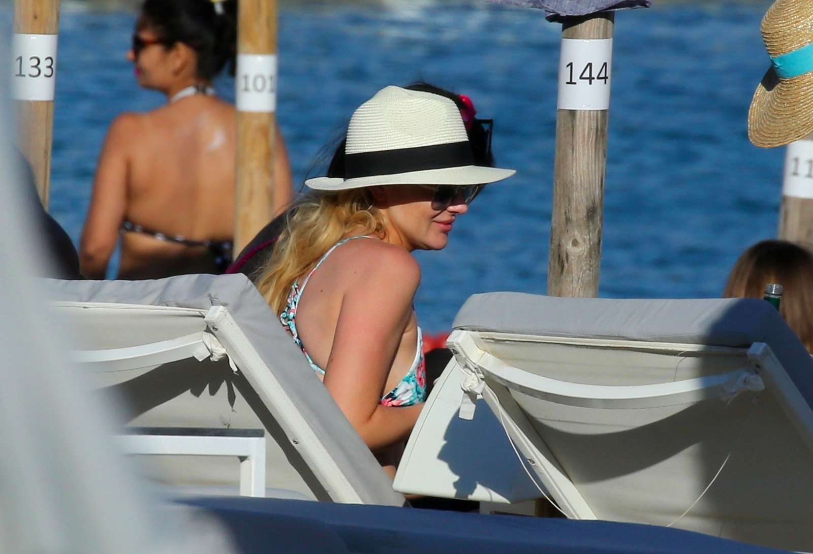 Stephanie Pratt in Colourful Bikini at a beach in Mykonos