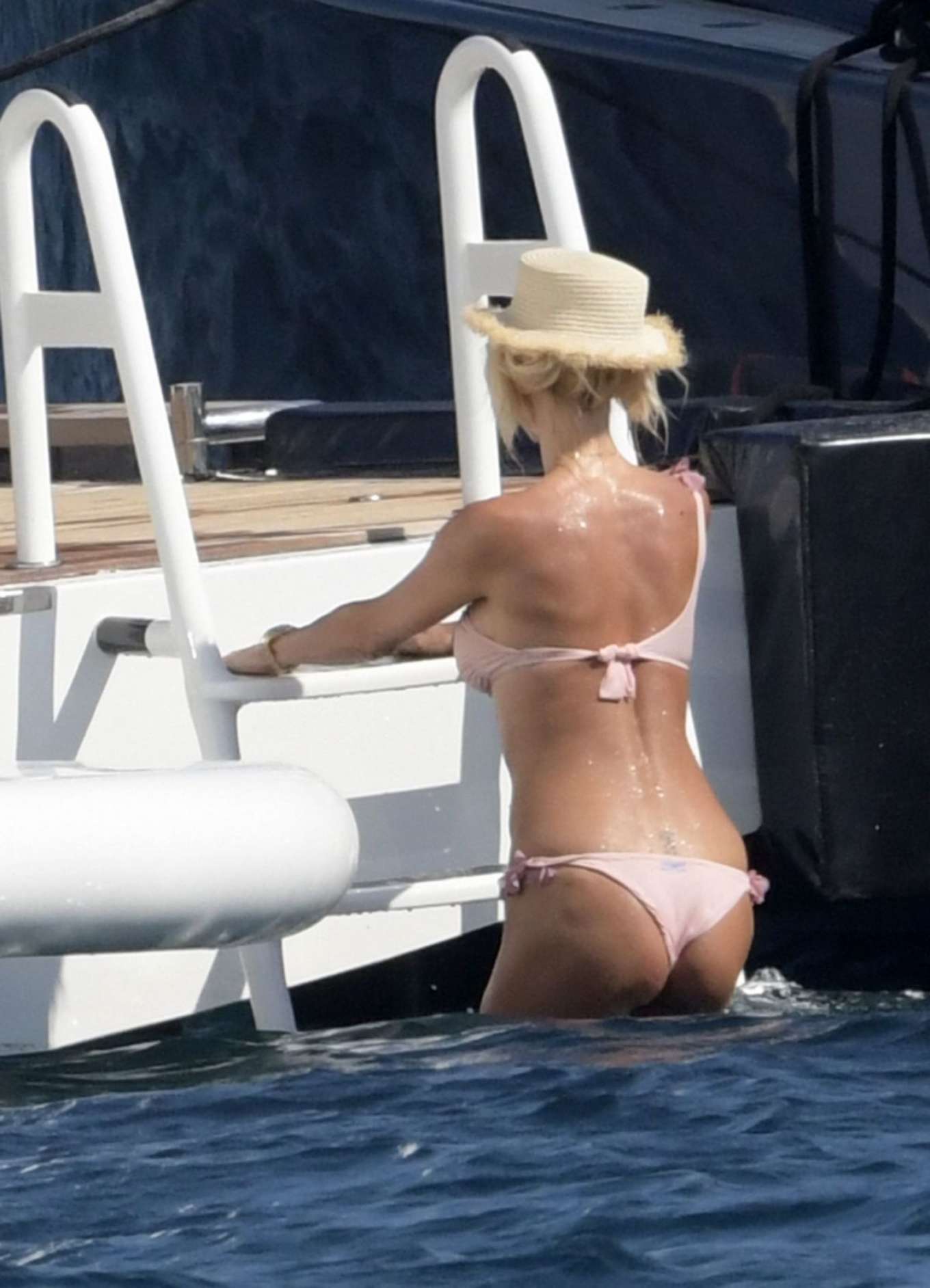 Victoria Silvstedt in Pink Bikini on a yacht in Sardinia