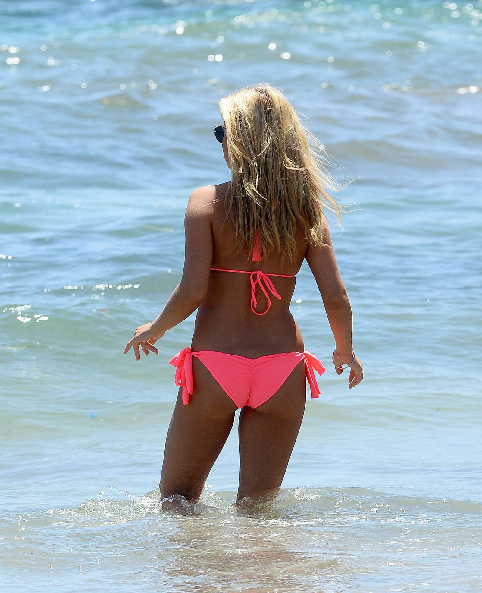 Zara Holland in Pink Bikini on the beach in Ibiza