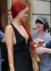 Rihanna - sezy cleavage candids in a black dress out in Paris
