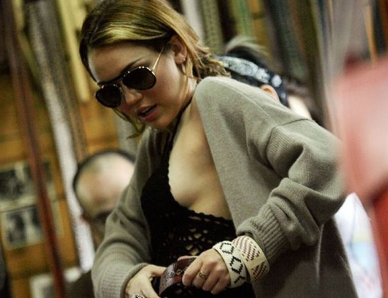 Miley Cyrus - Sideboob Candids in Chile