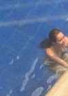 Miley Cyrus - Bikini Candids in a Pool in Quito, Ecuador