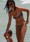 Adriana Lima - In ANOTHER BIKINI with her daughter in Miami