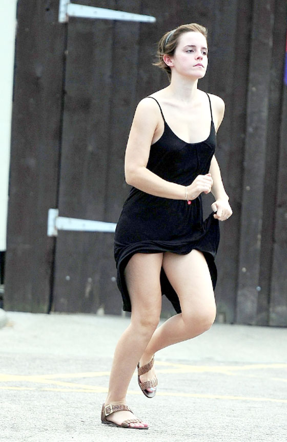 Emma Watson show her long legs while running