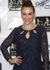 Alyssa Milano in short blue dress at A Night of Entertainment in Los Angeles, January 24, 2013