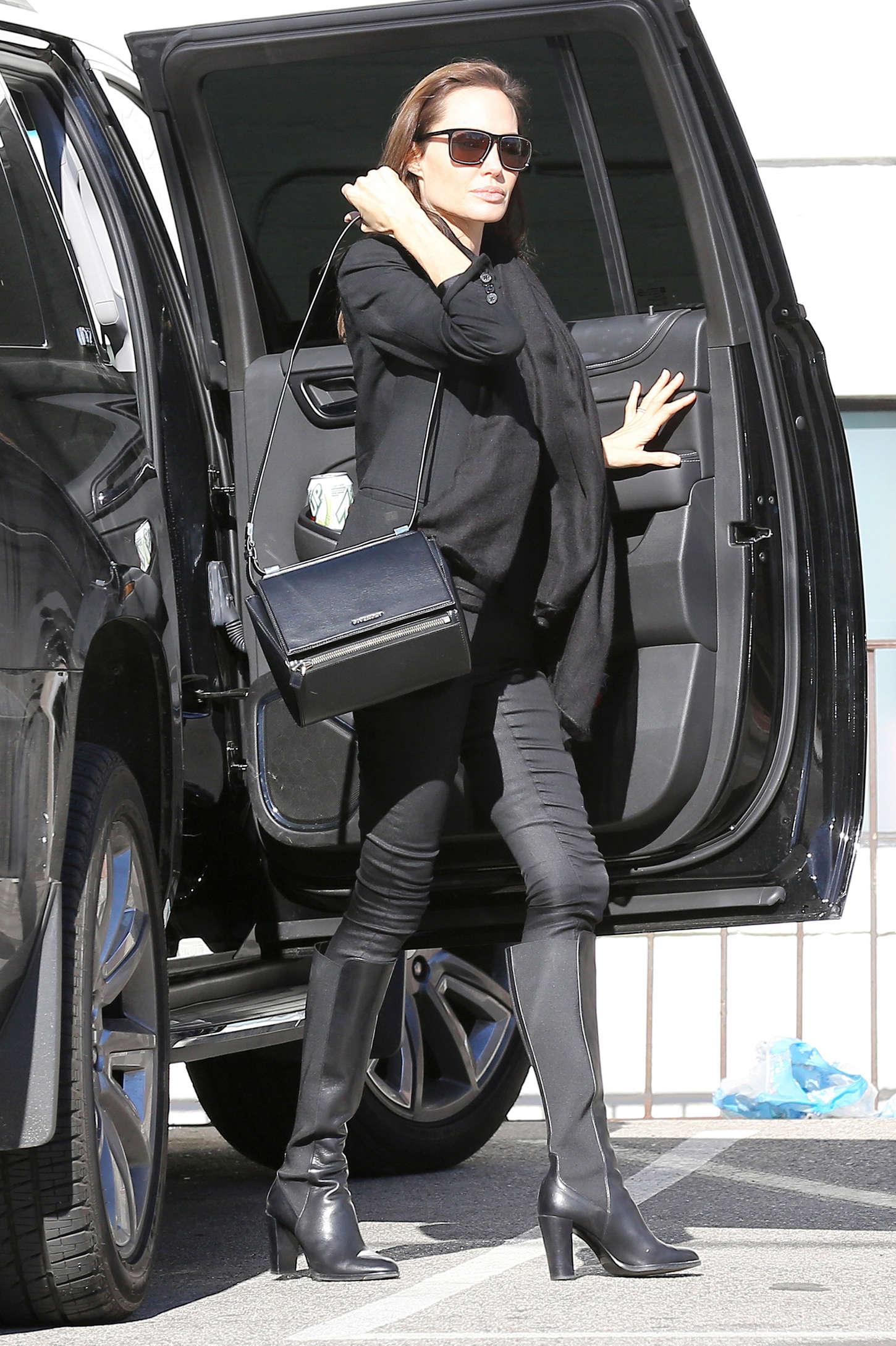 Angelina Jolie in Tight Pants Shopping at M. Fredric in Los Angeles