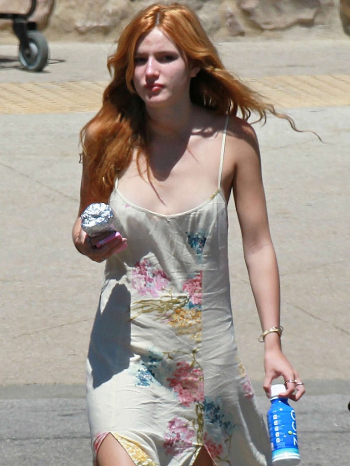 Bella Thorne in Low Cut Dress out in Malibu