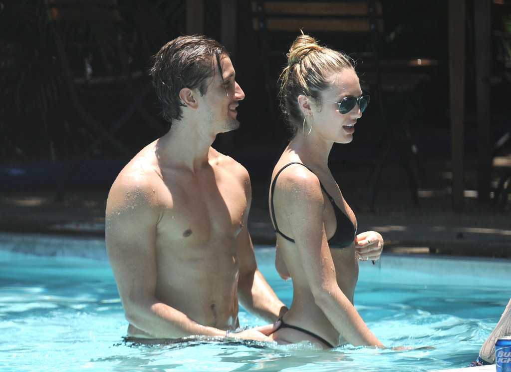 Candice Swanepoel - Bikini pool candids in Miami. 